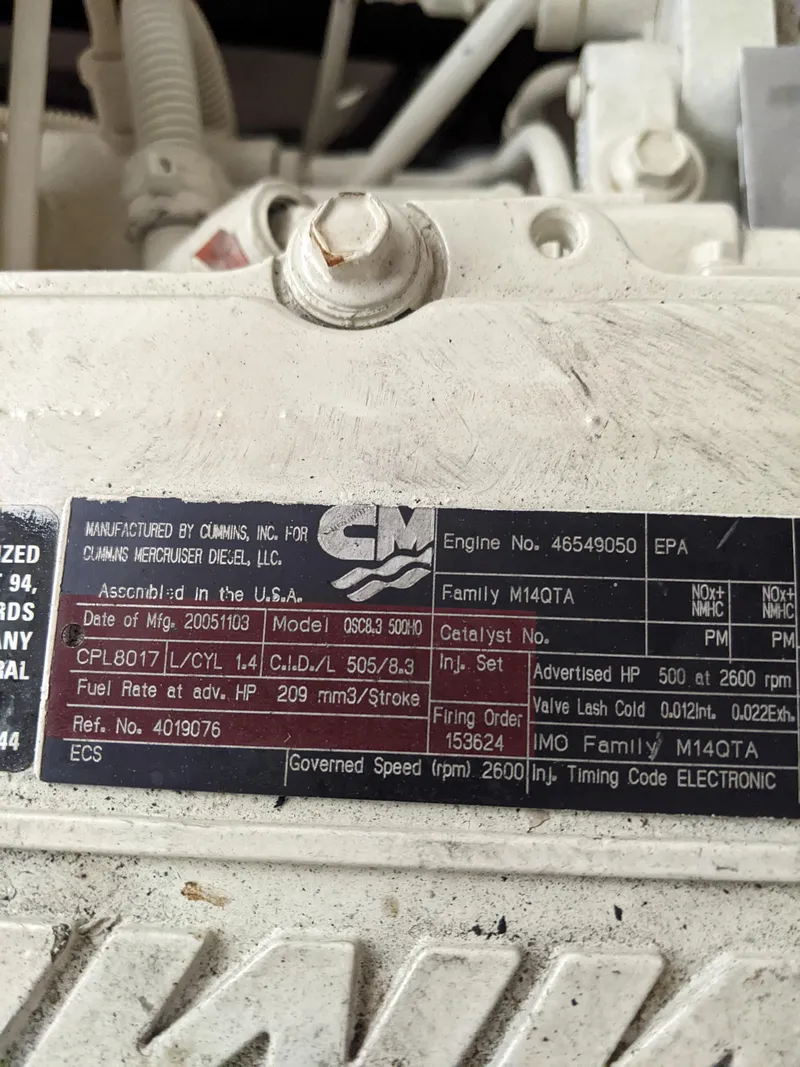 Slide: The Image of Engine label of a 2006 Sea Ray 44 Sundancer boat. - 35