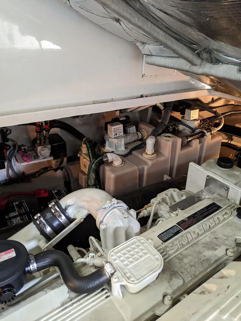 Slide: The Image of Engine compartment of a 2006 Sea Ray 44 Sundancer yacht. - 36