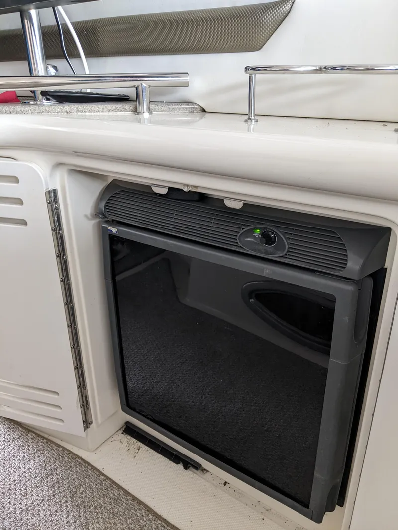 Slide: The Image of Mini fridge in 2006 Sea Ray 44 Sundancer yacht interior. - 7
