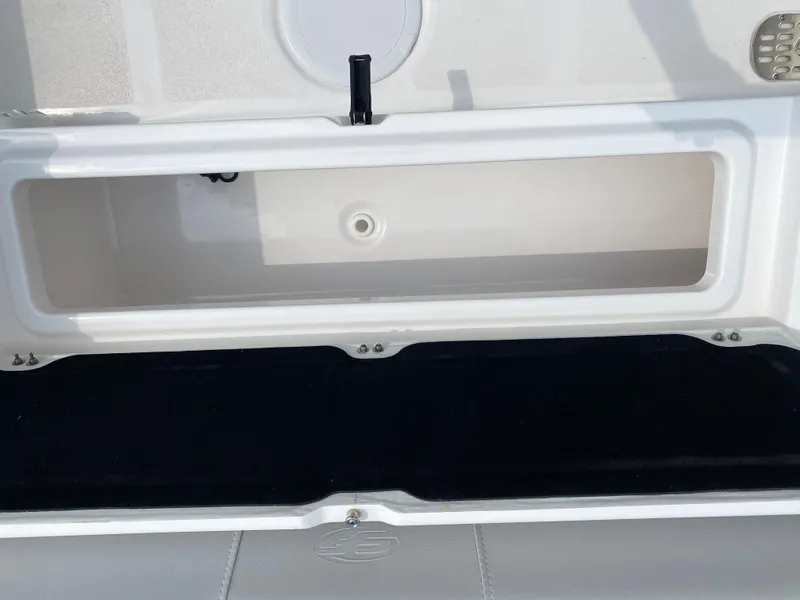 Slide: The Image of Open storage compartment on a 2020 Sea Fox Commander 248 boat. - 12