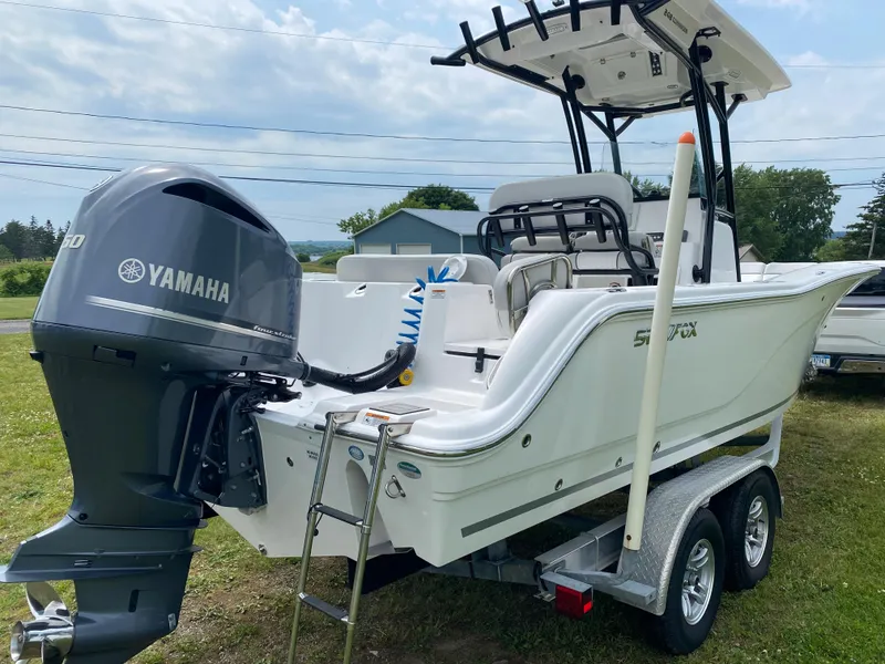 Slide: The Image of 2020 Sea Fox Commander 248 boat with Yamaha outboard engine on trailer. - 2