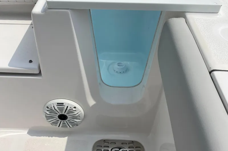 Slide: The Image of 2020 Sea Fox Commander 248 boat interior with speaker and storage compartment. - 20
