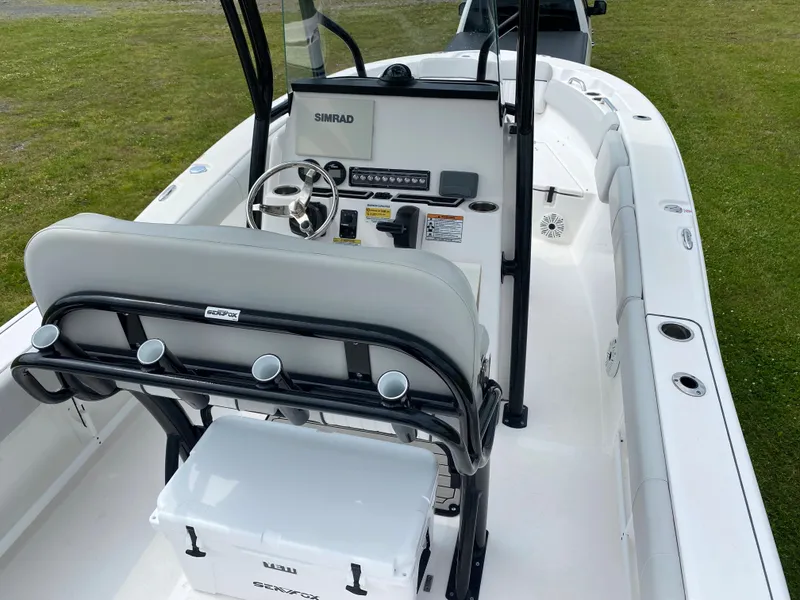 Slide: The Image of 2020 Sea Fox Commander 248 boat interior with steering console and seating. - 5