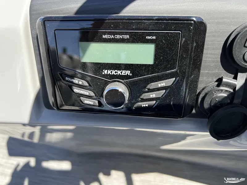 Slide: The Image of Kicker media center on 2022 Bennington 21 SXRF boat dashboard. - 5
