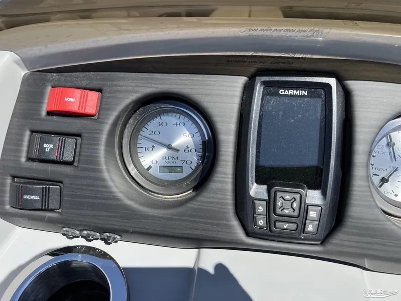 Slide: The Image of Dashboard of 2022 Bennington 21 SXRF with Garmin display and RPM gauge. - 6