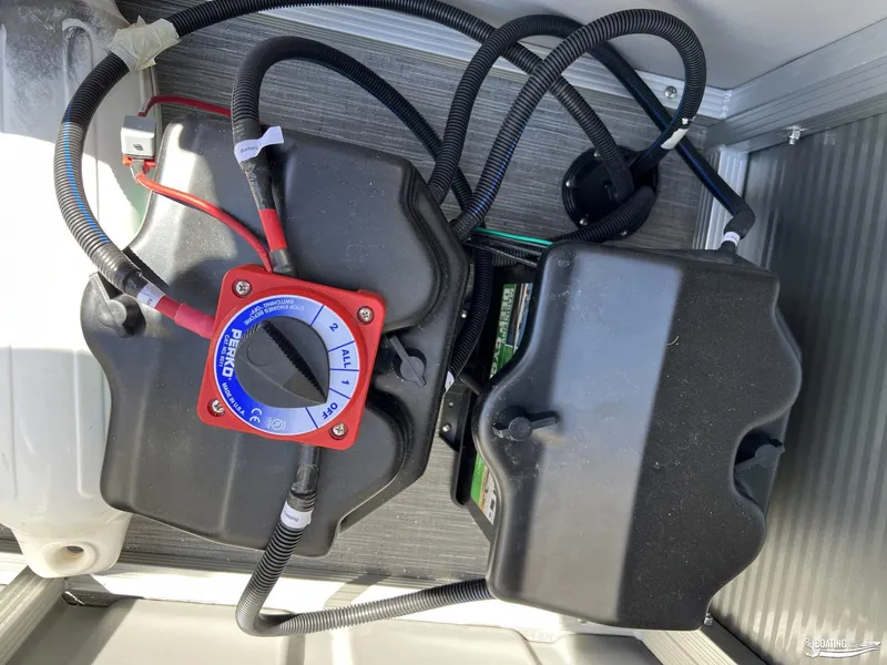 Slide: The Image of Battery compartment of 2022 Bennington 21 SXRF boat with Perko switch. - 7