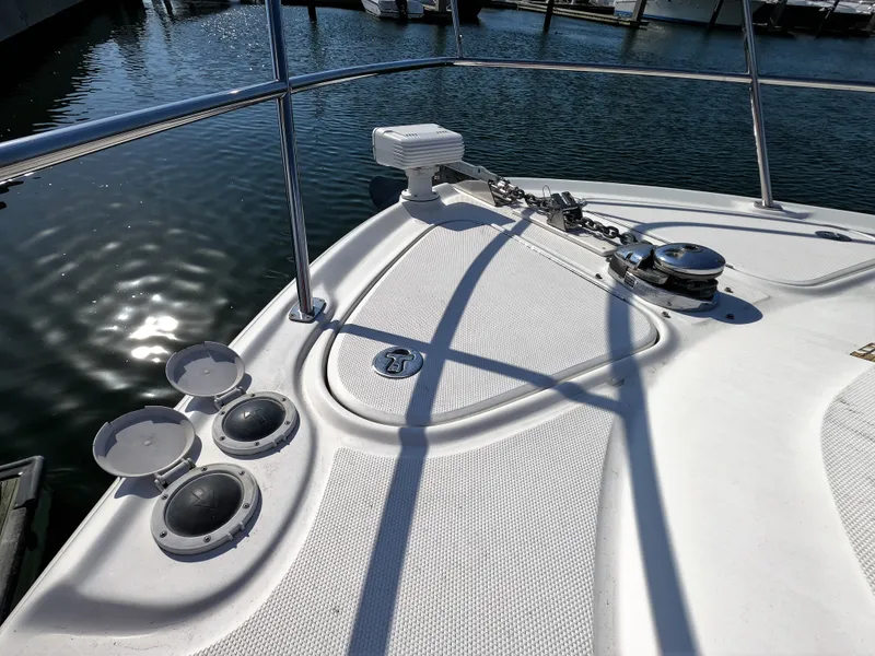 Slide: The Image of Bow deck of a 2007 Sea Ray 44 Sundancer yacht with anchor and fittings. - 11
