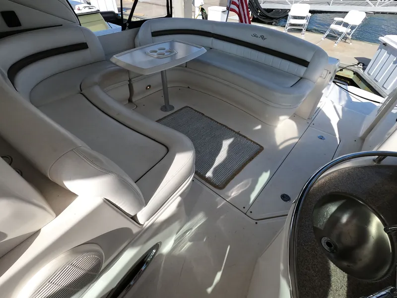 Slide: The Image of 2007 Sea Ray 44 Sundancer yacht interior with white seating and table. - 17
