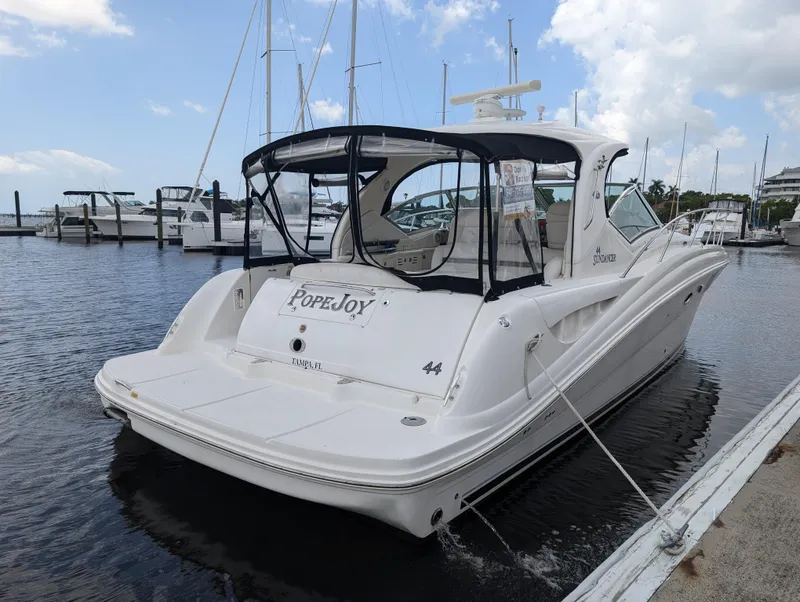 Slide: The Image of 2007 Sea Ray 44 Sundancer yacht docked at marina, rear view. - 3