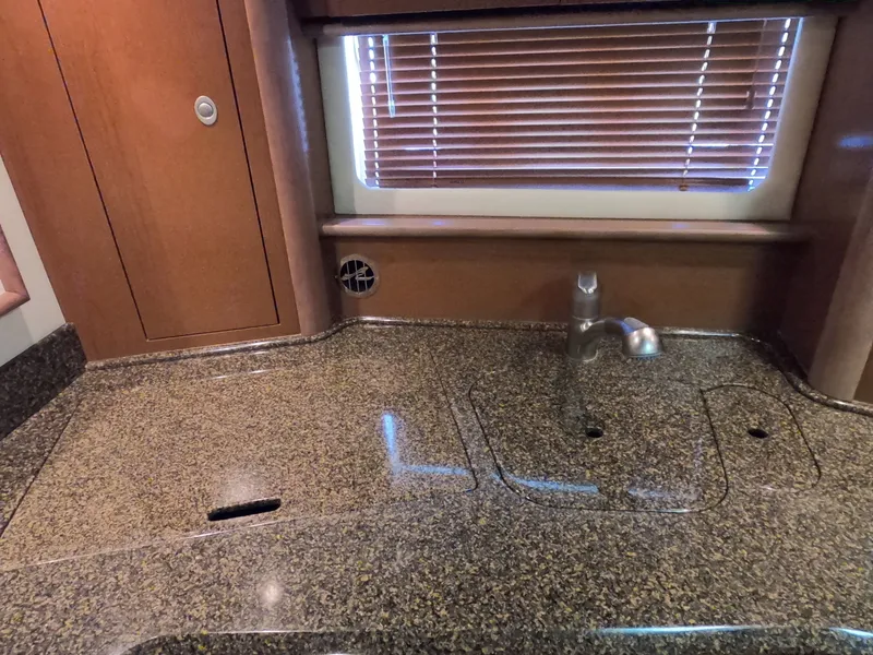 Slide: The Image of Granite countertop and sink in 2007 Sea Ray 44 Sundancer yacht kitchen. - 38