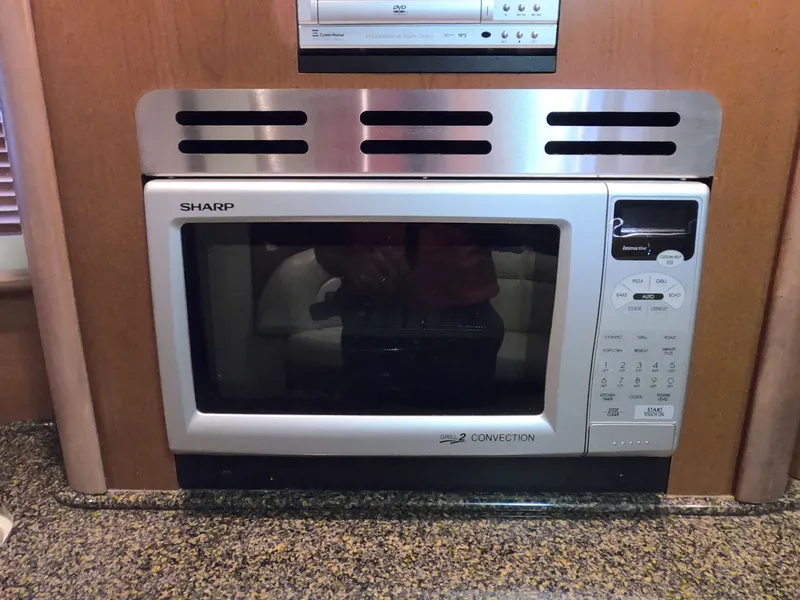 Slide: The Image of Sharp convection microwave in 2007 Sea Ray 44 Sundancer yacht kitchen. - 40