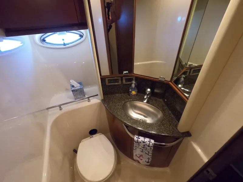 Slide: The Image of Luxurious bathroom in 2007 Sea Ray 44 Sundancer yacht with granite countertop. - 47