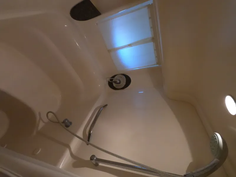 Slide: The Image of Shower area in 2007 Sea Ray 44 Sundancer yacht, featuring modern fixtures. - 49