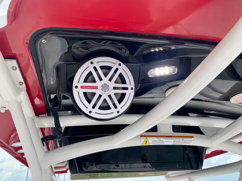 Slide: The Image of 2019 Wellcraft 241 Bay boat with overhead speaker and LED lights. - 18