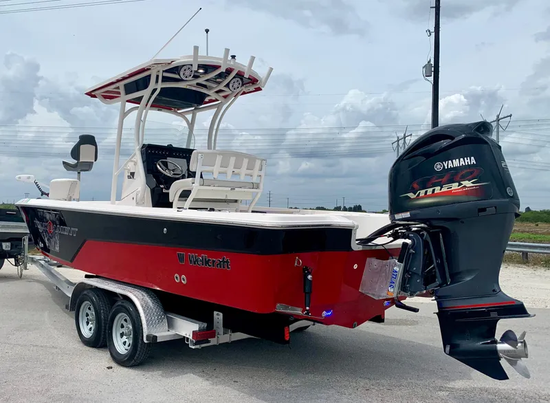 Slide: The Image of 2019 Wellcraft 241 Bay boat with Yamaha VMAX engine on trailer. - 7