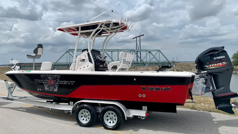 Slide: The Image of 2019 Wellcraft 241 Bay boat with Yamaha VMAX engine on trailer. - 8