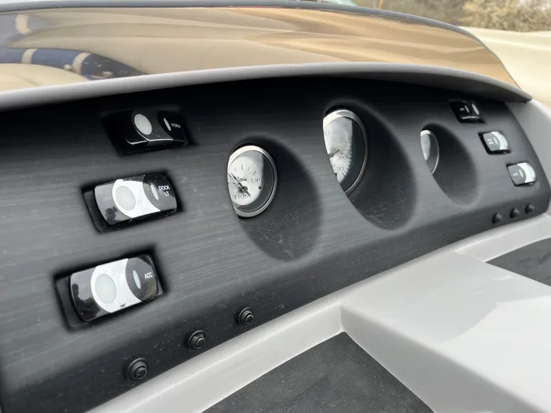 Slide: The Image of Dashboard of a 2021 Bennington 22 SSLXP boat with gauges and controls. - 14