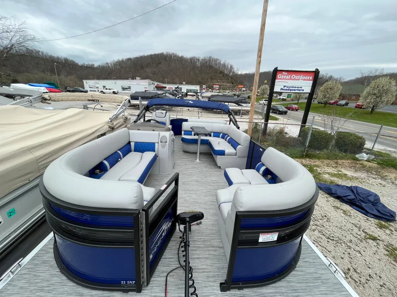 Slide: The Image of 2021 Bennington 22 SSLXP pontoon boat with spacious seating and modern design. - 3