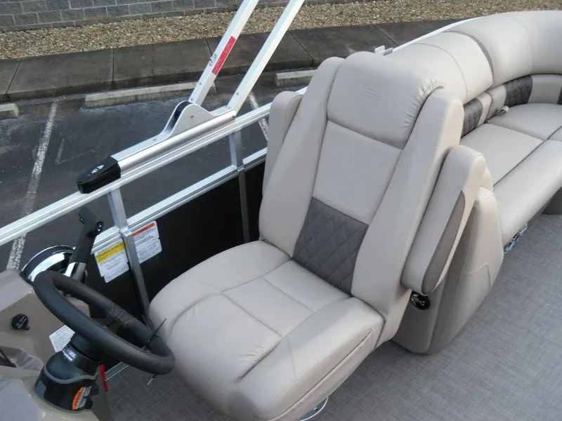 Slide: The Image of 2023 Sun Tracker PARTY BARGE® 22 XP3 captain's chair and helm. - 28