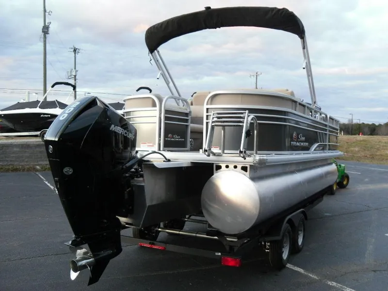 Slide: The Image of 2023 Sun Tracker PARTY BARGE® 22 XP3 pontoon boat with Mercury outboard motor. - 7