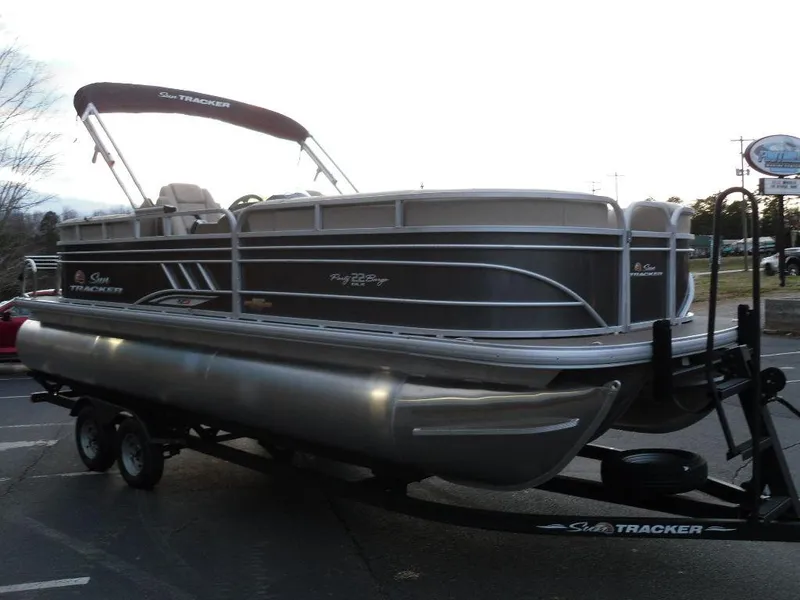 Slide: The Image of 2023 Sun Tracker PARTY BARGE® 22 XP3 pontoon boat on trailer. - 8