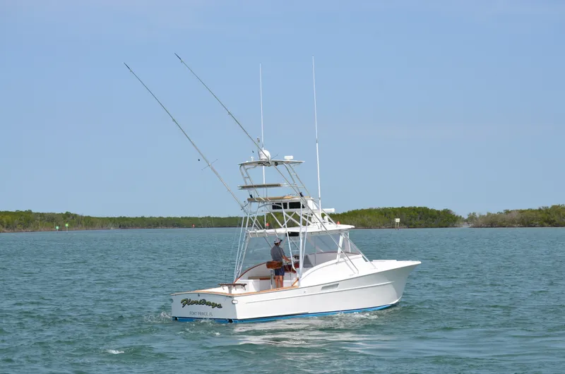 The Image of 1993 Gamefisherman Open boat on calm waters. - 0