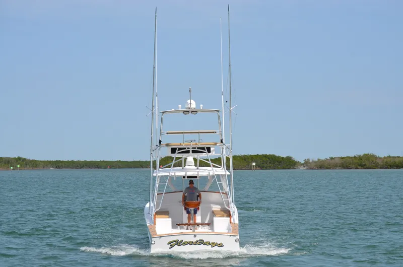 Slide: The Image of Gamefisherman Open 1993 boat on calm water. - 1