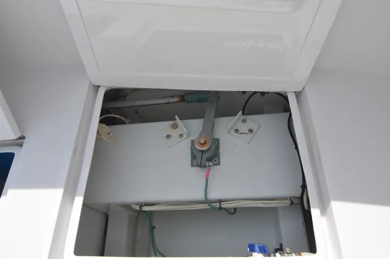 Slide: The Image of Interior view of a 1993 Gamefisherman Open boat, showing technical details. - 26