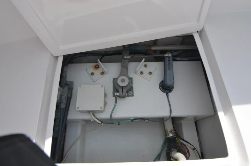 Slide: The Image of Interior view of a 1993 Gamefisherman Open boat, showing technical components. - 27
