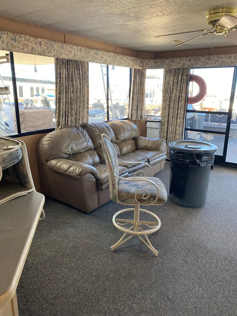 Slide: The Image of Interior of 2001 Stardust Cruisers Summer Dreamin' Trip, featuring cozy seating and large windows. - 23