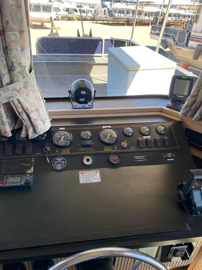Slide: The Image of Control panel of 2001 Stardust Cruisers Summer Dreamin' Trip 37 and 38 houseboat. - 25