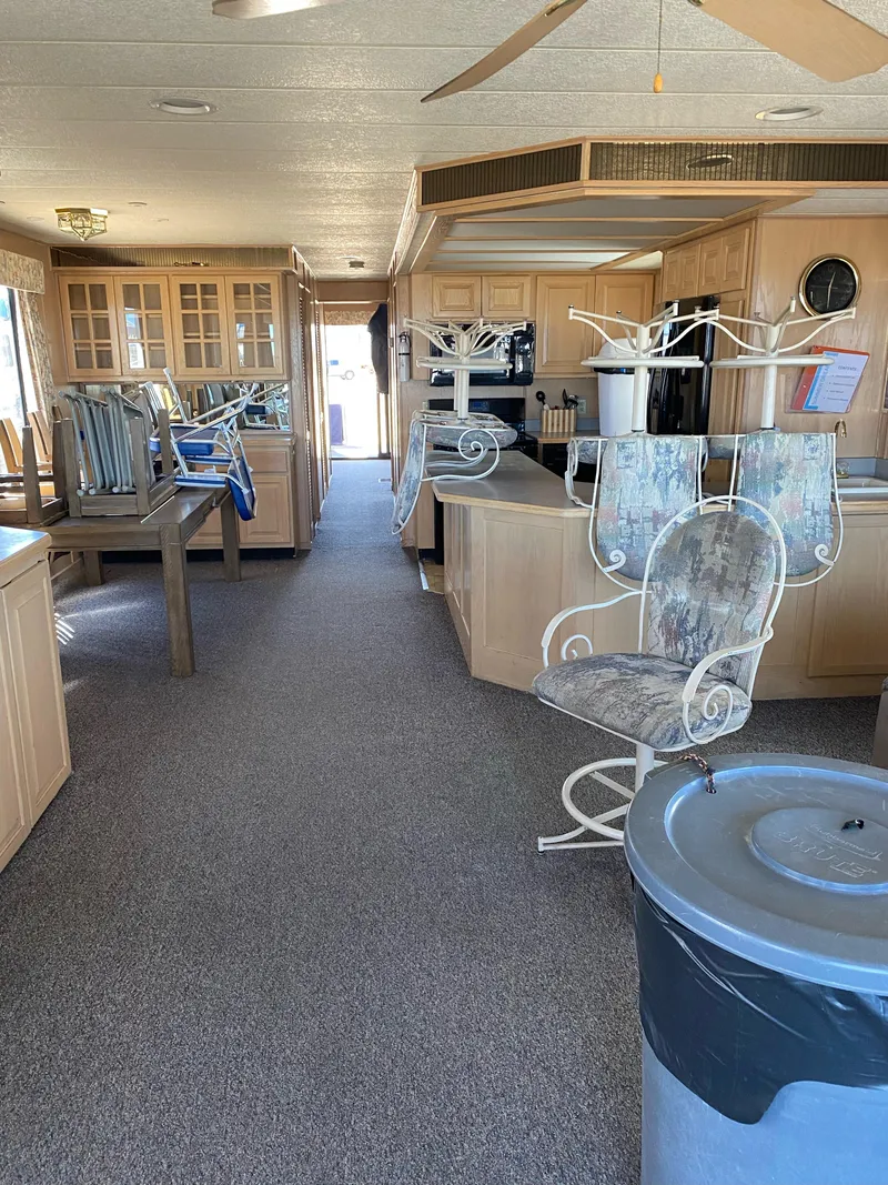 Slide: The Image of Interior of 2001 Stardust Cruisers Summer Dreamin' Trip, featuring spacious kitchen and dining area. - 28