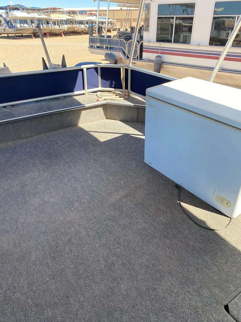 Slide: The Image of 2001 Stardust Cruisers Summer Dreamin' Trip deck with seating and storage box. - 29
