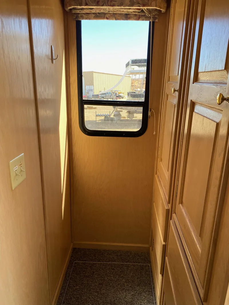 Slide: The Image of Narrow hallway with window in 2001 Stardust Cruisers Summer Dreamin' Trip 37 and 38. - 6