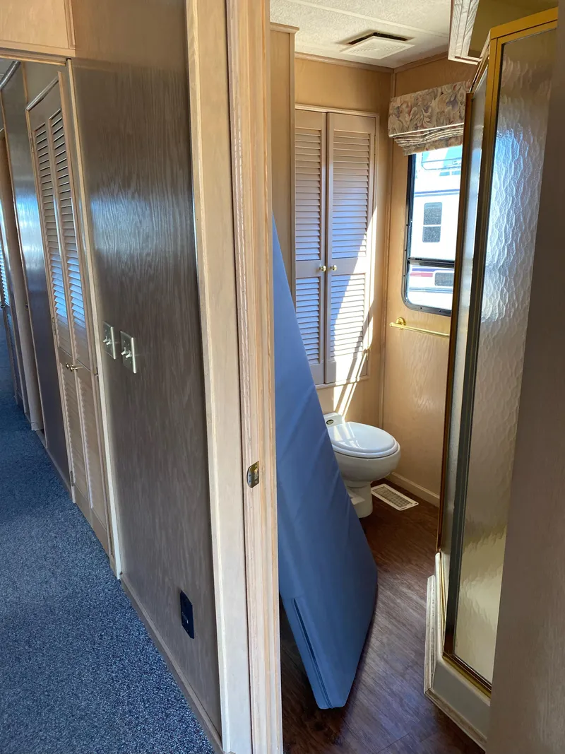 Slide: The Image of Interior of 2001 Stardust Cruisers Summer Dreamin' Trip, featuring bathroom and hallway. - 7