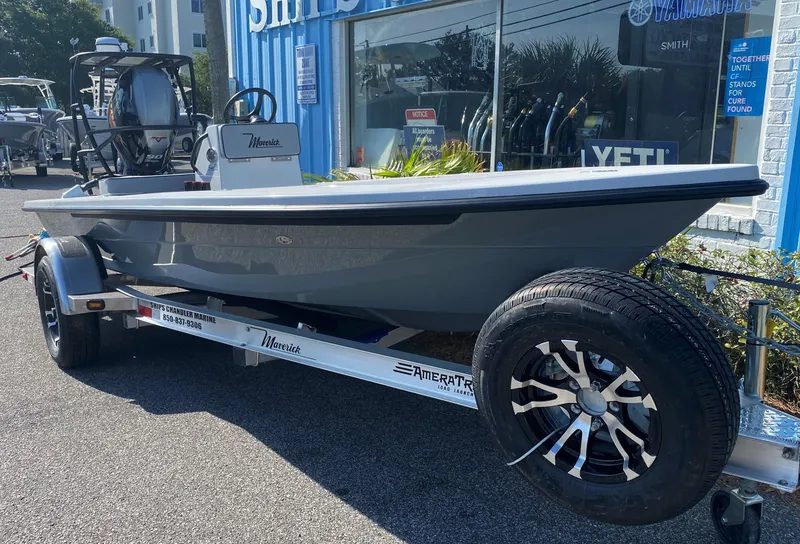 Slide: The Image of 2024 Maverick 17 HPX-V boat on trailer outside dealership. - 10