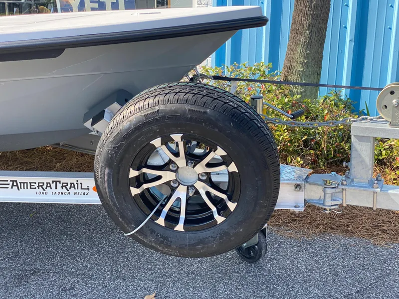 Slide: The Image of 2024 Maverick 17 HPX-V boat trailer with spare tire and AmeraTrail logo. - 3