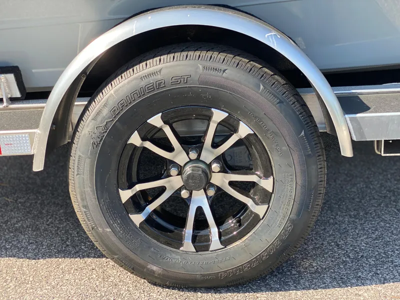 Slide: The Image of 2024 Maverick 17 HPX-V trailer wheel and tire close-up. - 4