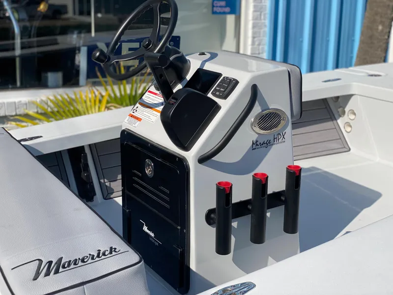 Slide: The Image of 2024 Maverick 17 HPX-V boat console with steering wheel and rod holders. - 5