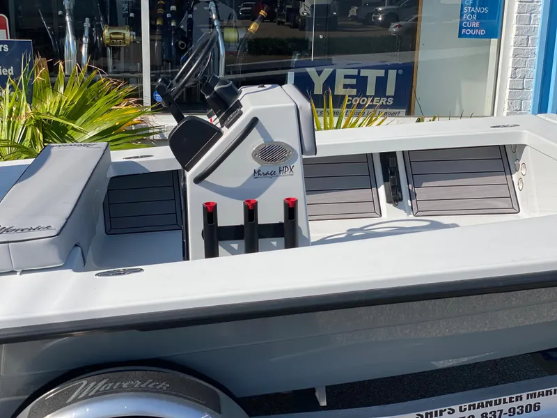 Slide: The Image of 2024 Maverick 17 HPX-V boat on display outside a store. - 7