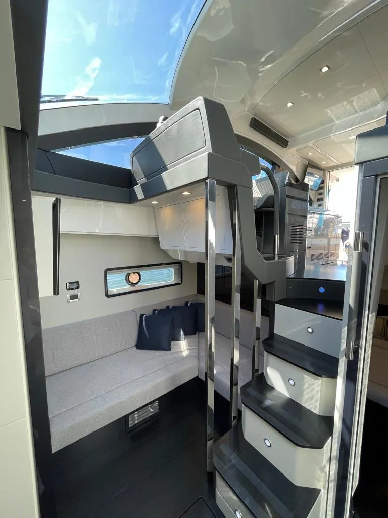 Slide: The Image of Interior of 2025 Schaefer 510 GT yacht, featuring modern design and luxurious seating. - 18