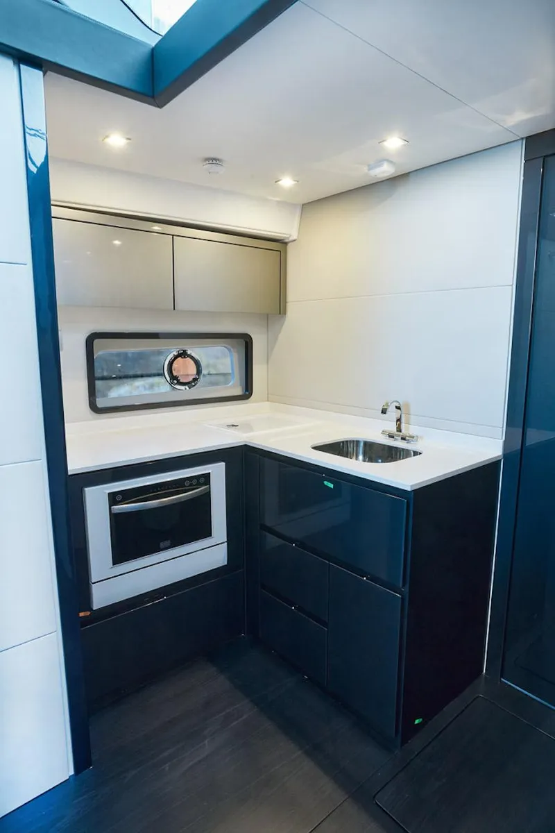 Slide: The Image of Modern kitchen interior of 2025 Schaefer 510 GT yacht with sleek design and appliances. - 20