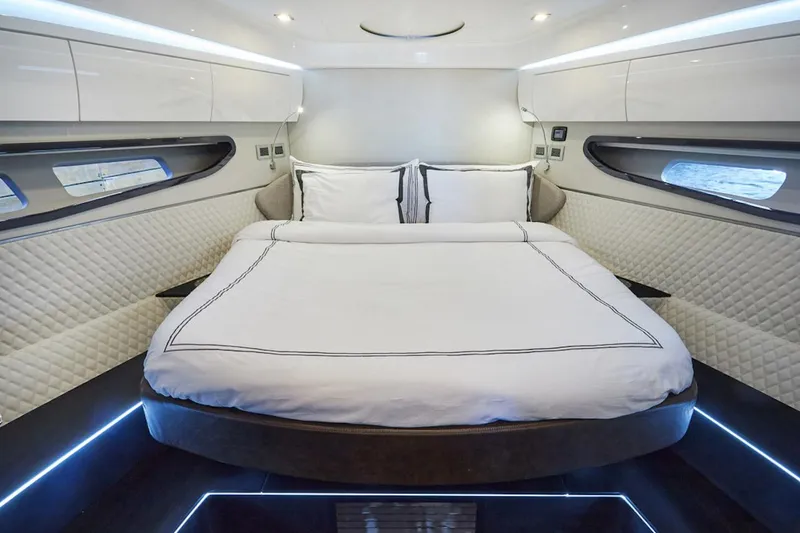 Slide: The Image of Luxurious bedroom interior of 2025 Schaefer 510 GT yacht with modern design and ambient lighting. - 21