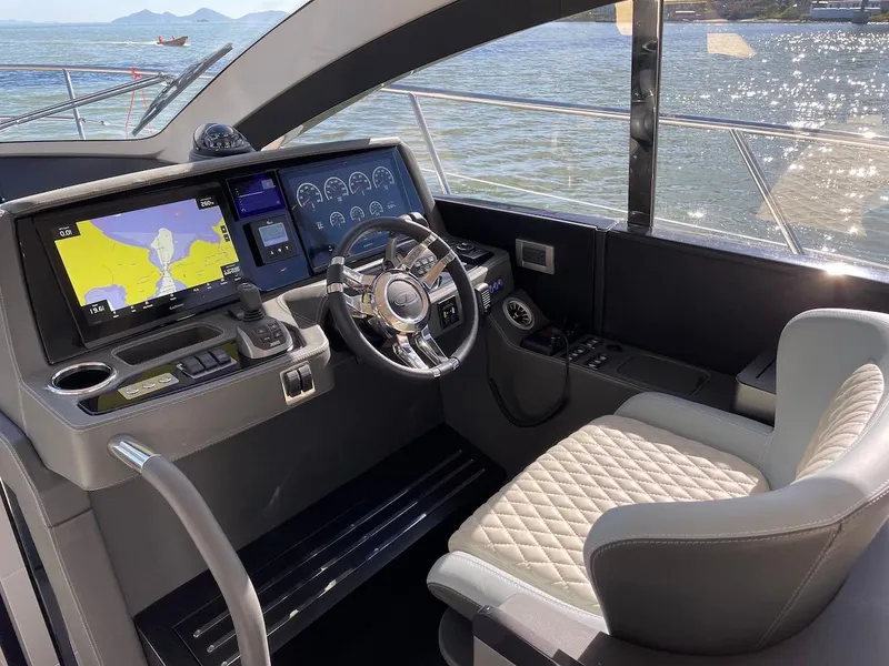 Slide: The Image of Luxury helm of 2025 Schaefer 510 GT yacht with advanced navigation system. - 30