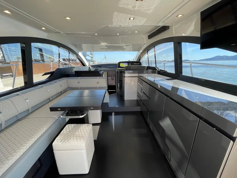 Slide: The Image of Luxurious interior of 2025 Schaefer 510 GT yacht with modern seating and sleek design. - 31