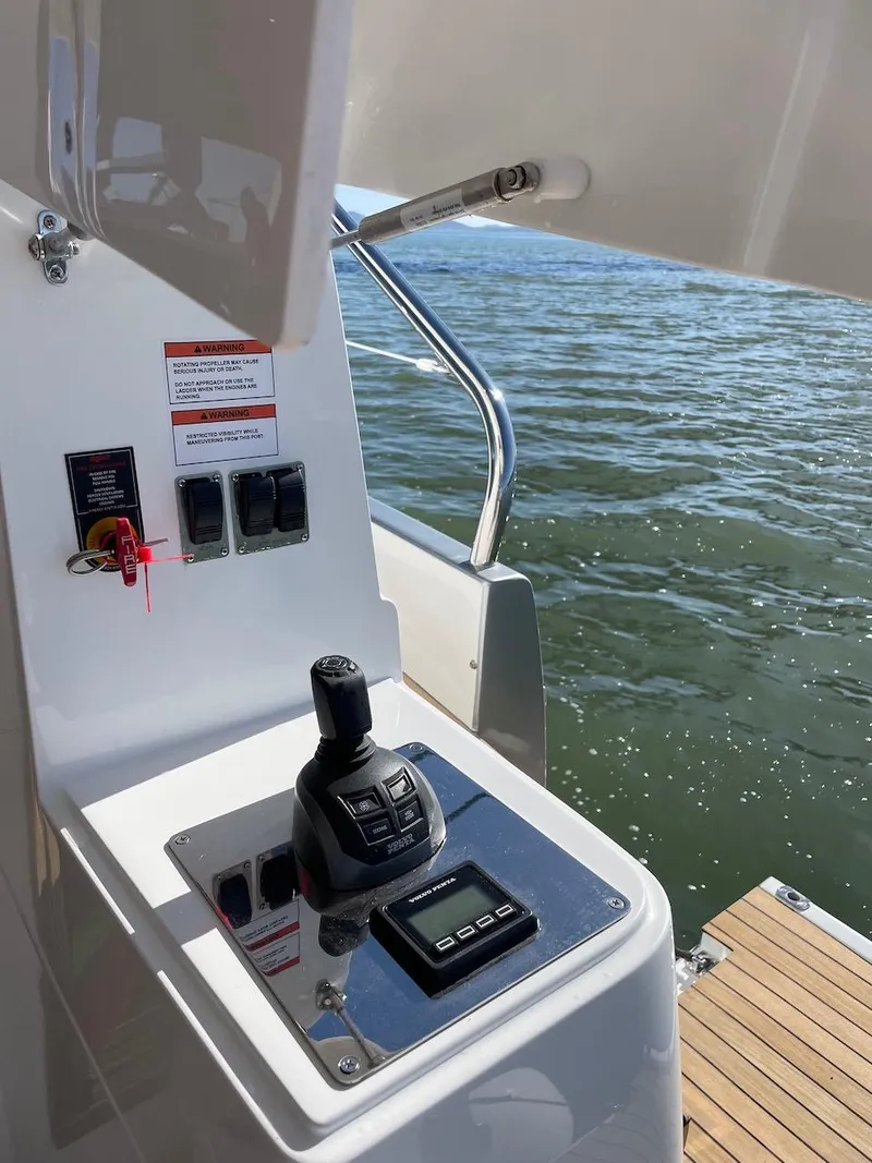 Slide: The Image of Control panel of 2025 Schaefer 510 GT yacht with water view. - 35