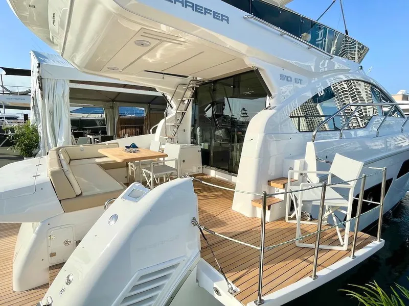 Slide: The Image of Luxurious 2025 Schaefer 510 GT yacht with elegant deck and seating area. - 40