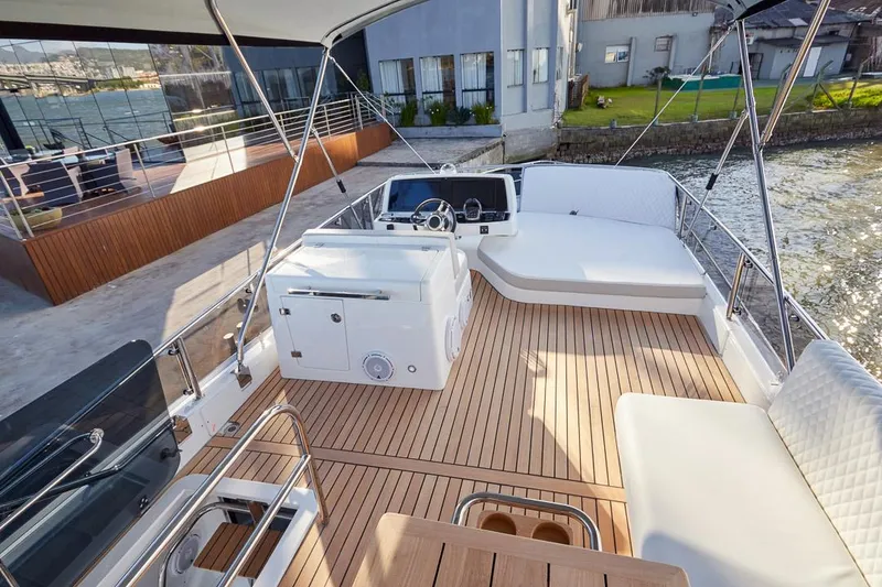 Slide: The Image of Luxurious 2025 Schaefer 510 GT yacht deck with elegant seating and modern design. - 39