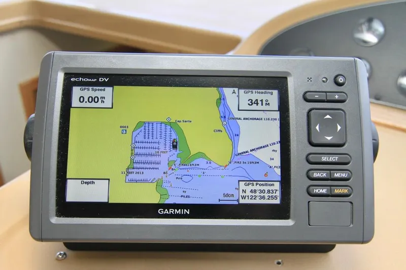 Slide: The Image of Garmin GPS display on 2002 Bayliner 3988 Command Bridge Motoryacht, showing navigation map and coordinates. - 45