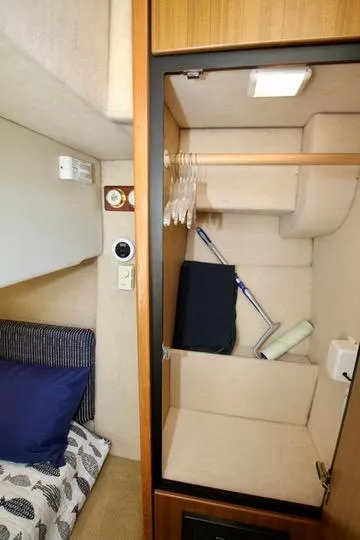 Slide: The Image of Interior of 2002 Bayliner 3988 Command Bridge Motoryacht with closet and bed. - 56